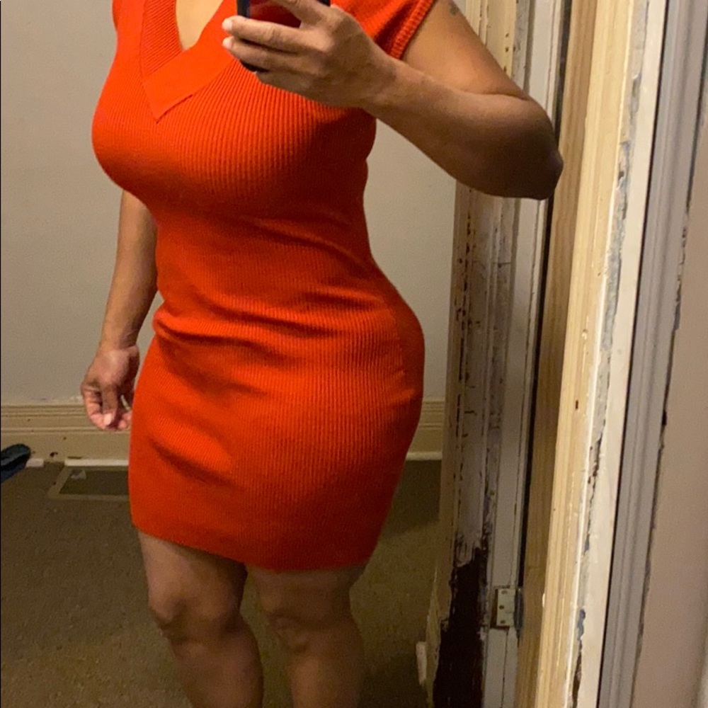 Red form fitting dress